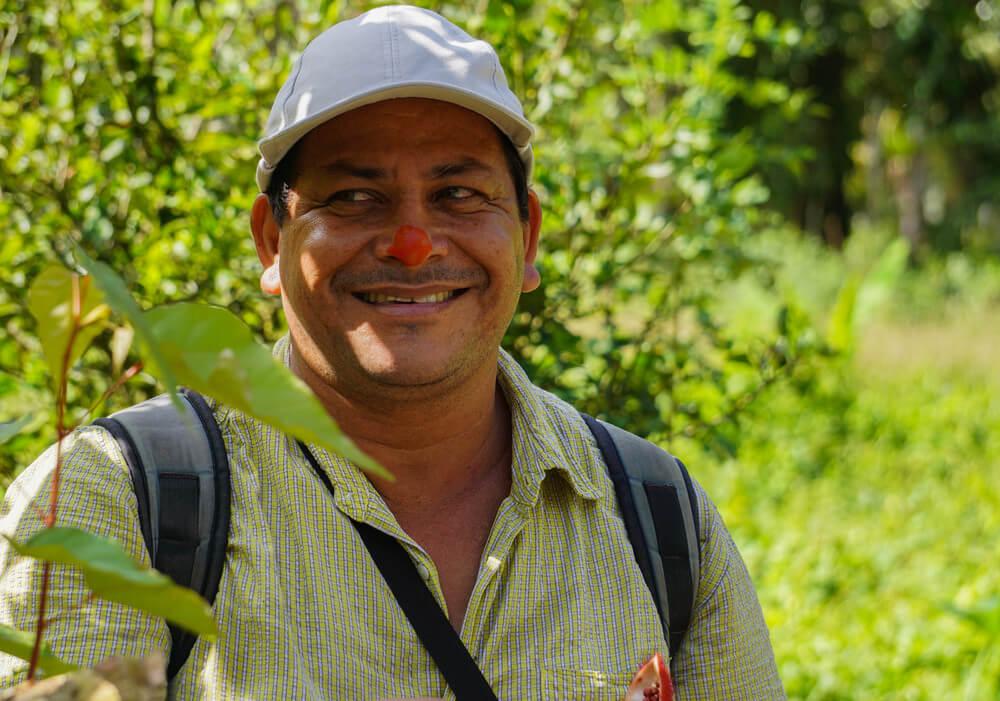 Los Guatuzos: A Wildlife Refuge in Nicaragua: Armando demonstrating the natural colouring of achiote which is also used as a spice.