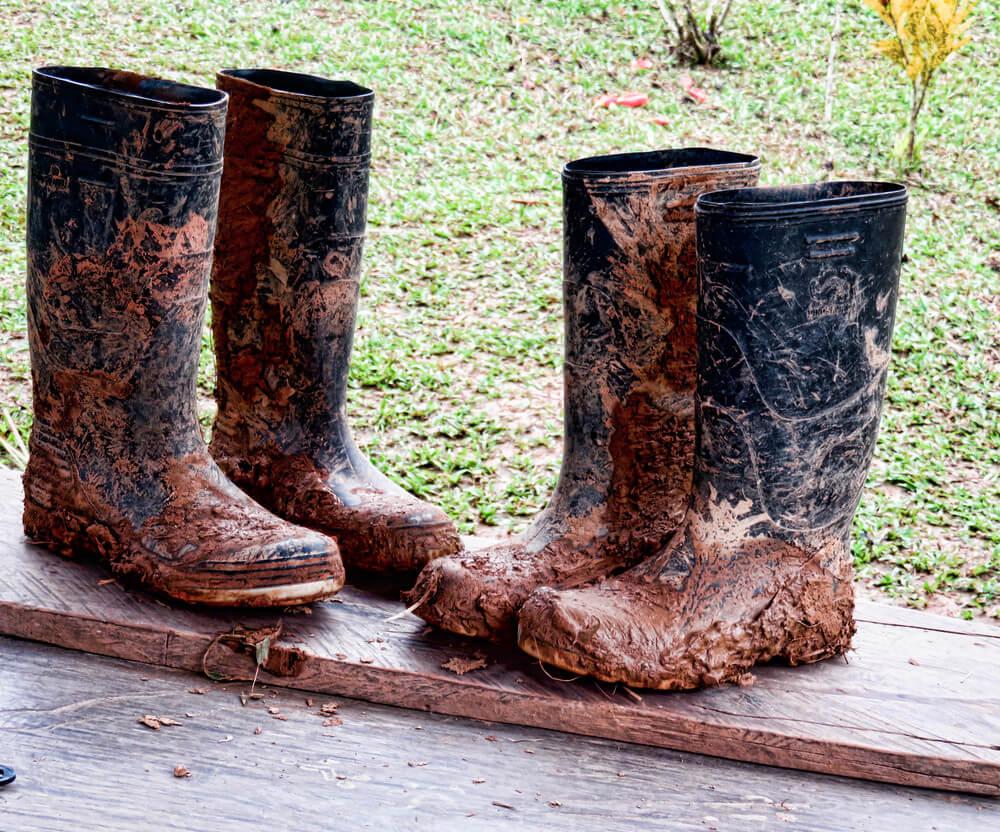 Nicaragua: Travel to the Rainforest: muddy rubber boots