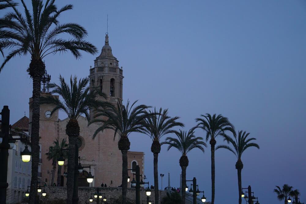 Sitges Spain: palm trees and beautiful buildings