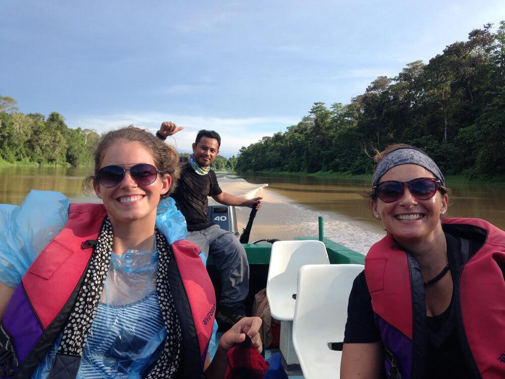 Nomadic life: exploring in Borneo, 2 women in a boat, the driver behind