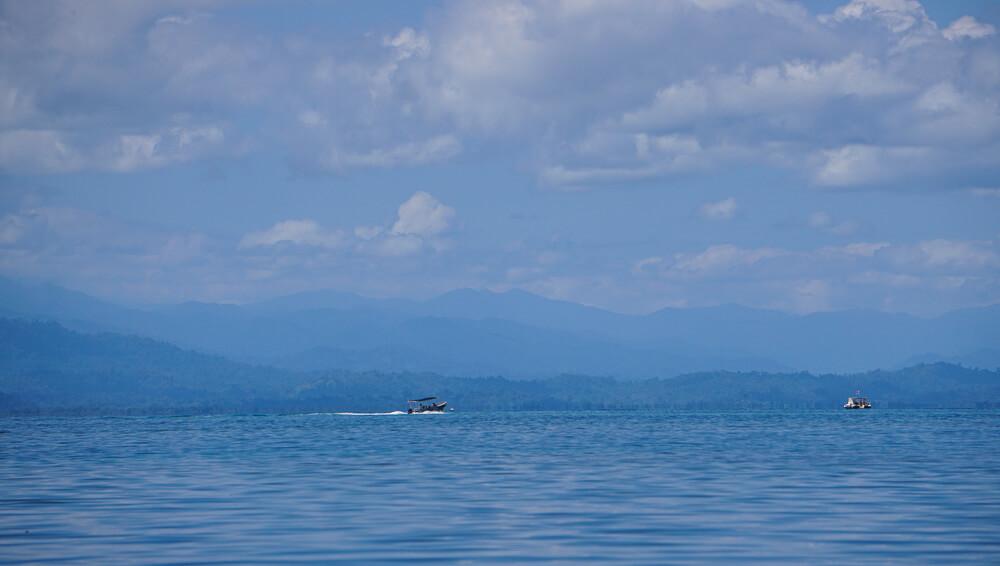 blue seas and mountains in the background; Panama needs proof of onward travel