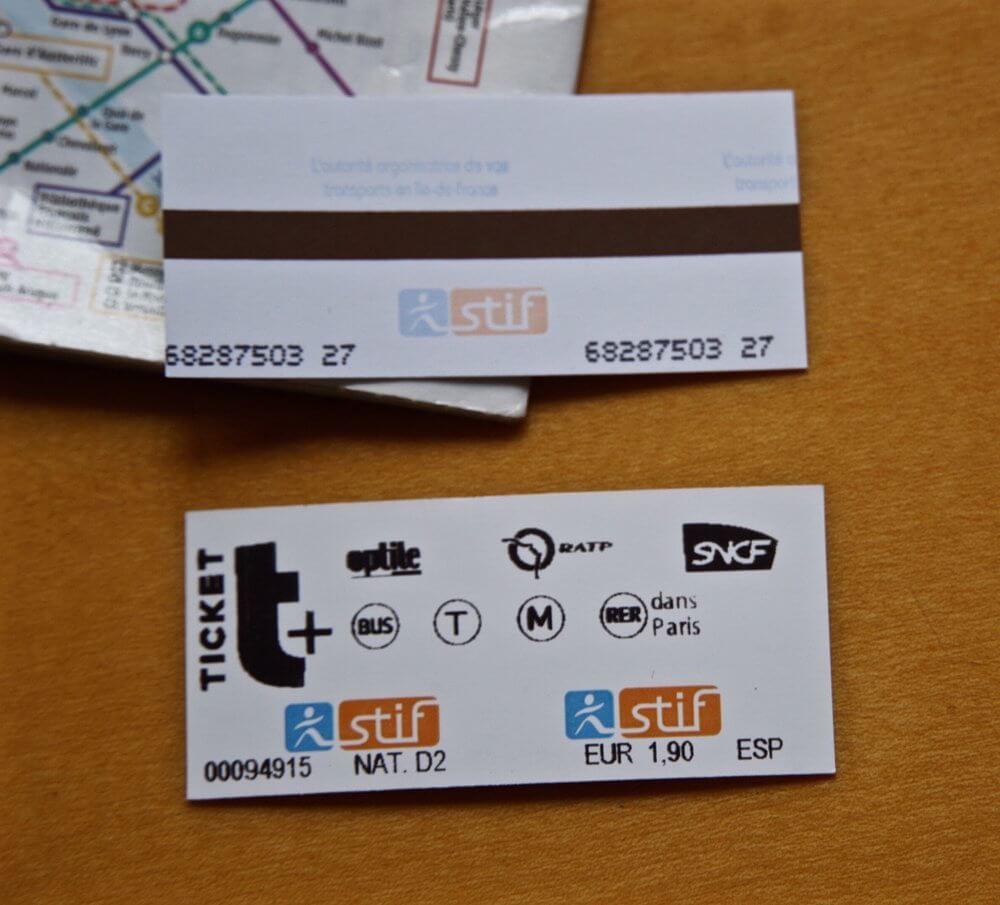 How to use the Paris metro- The white rectangular ticket with text on the front, magnetic strip on back