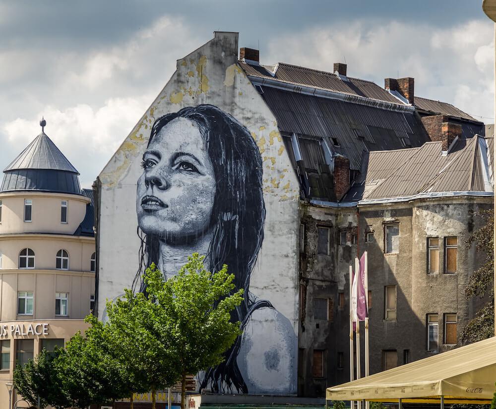 Ostrava Czech Republic: Street art of a girl looking off into space