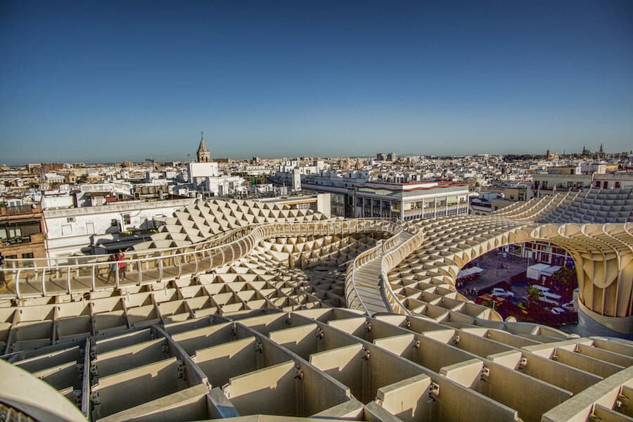 Looking across the white honeycomb roof out across Seville