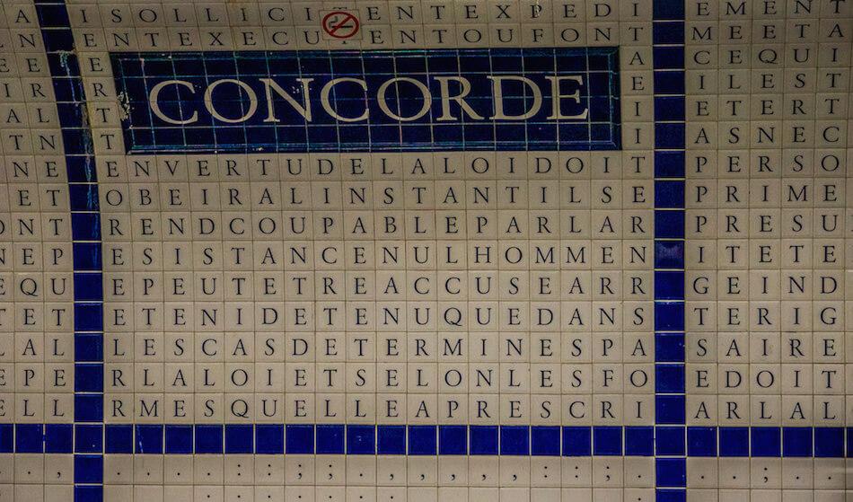 How to use the Paris Metro: blue and white square tiles with letters on the opposite colour