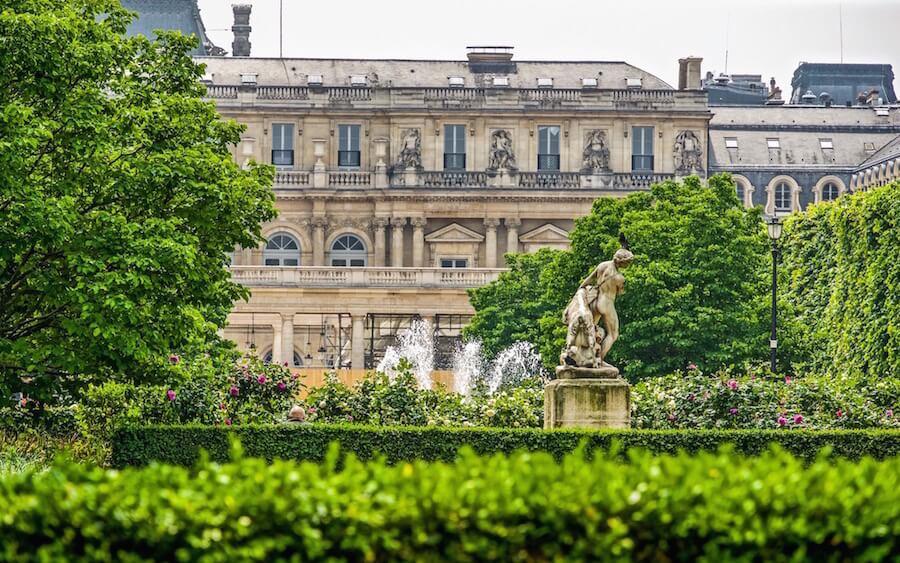 fountains, sculpture, French building and gardens at Le Palais Royale