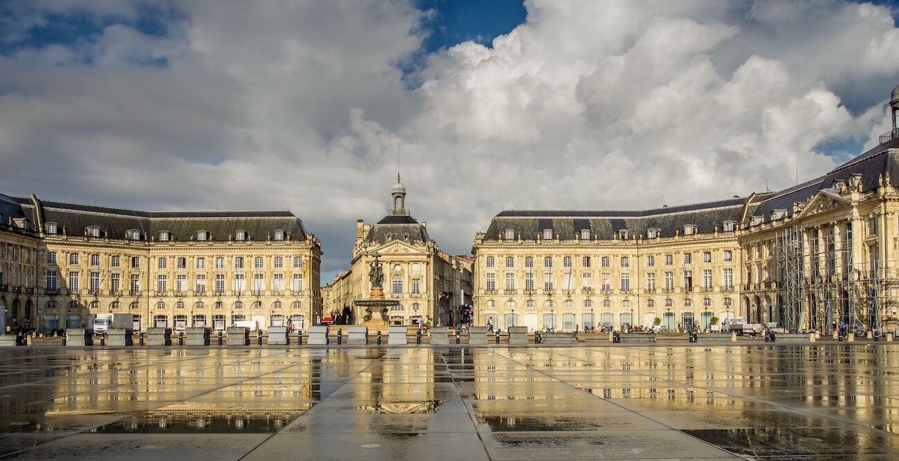 Visit Bordeaux | Place de la Bourse reflected in the puddles