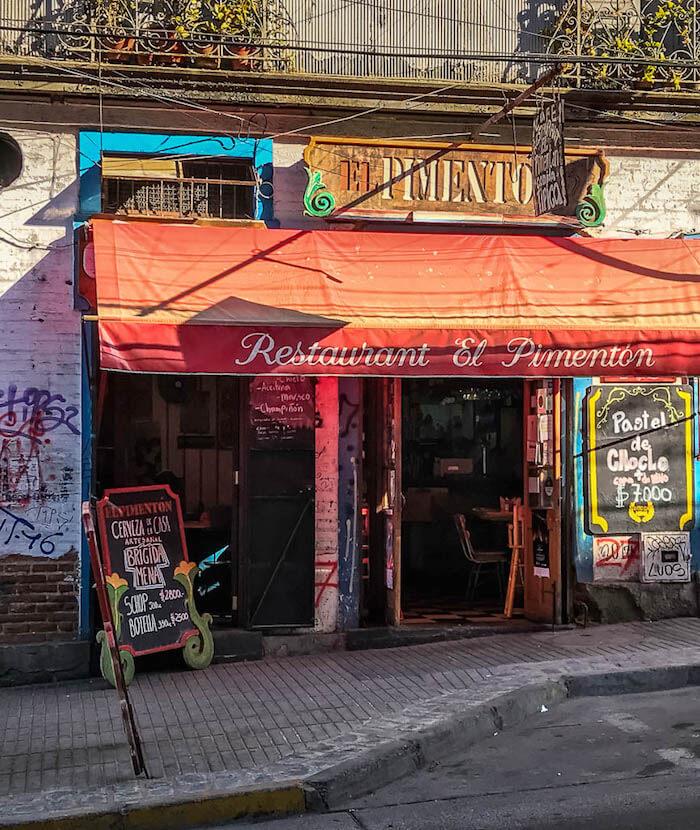 orange awning with lettering Restaurant el Pimenton