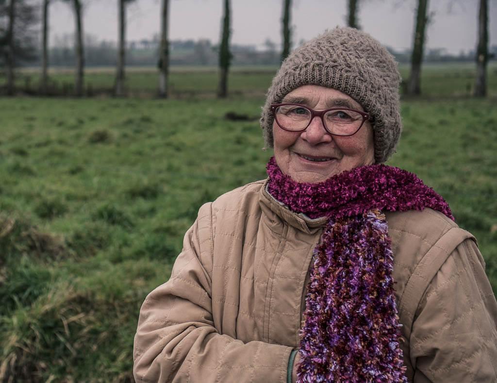 How to become a housesitter: Meet neighbours such as this lovely lady with a glasses, scarf and hat and a smile