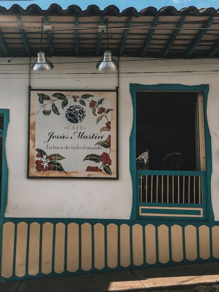 Café Jesús Martin with turquoise blue trim in Salento Colombia