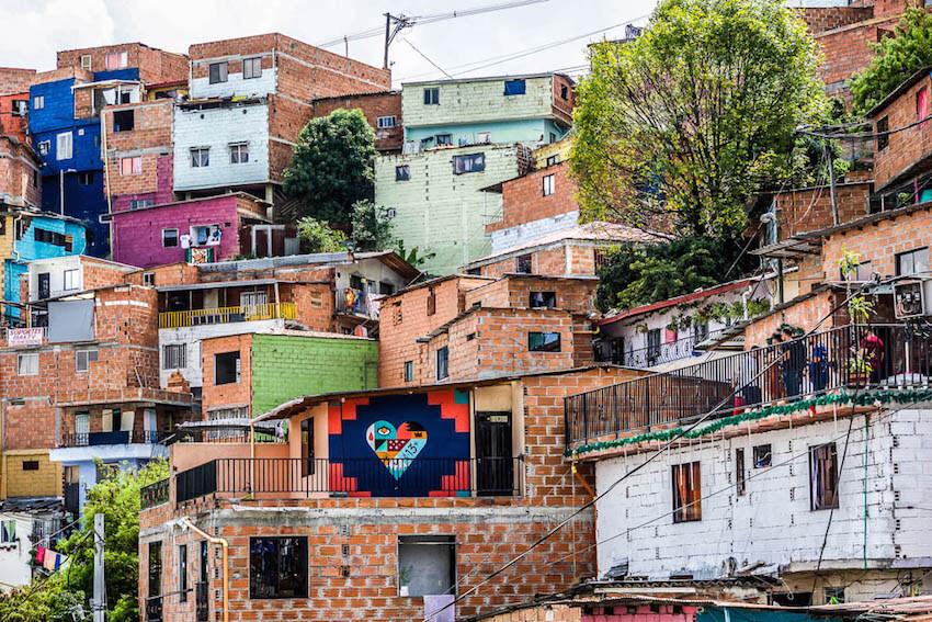 Brick homes jumbled together in Medellin Colombia. Is it on your South America itinerary?