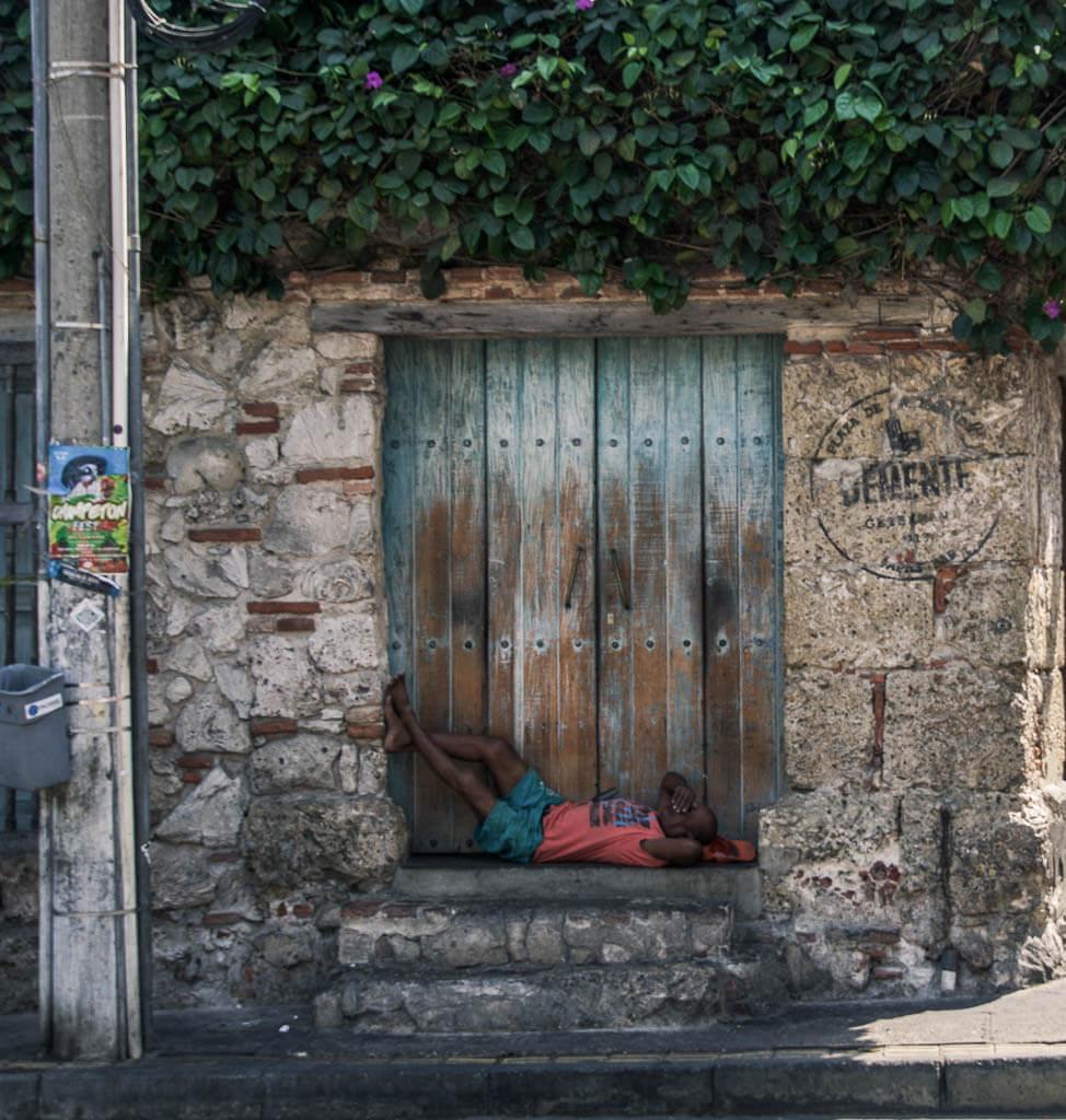 Man sleeping in doorway