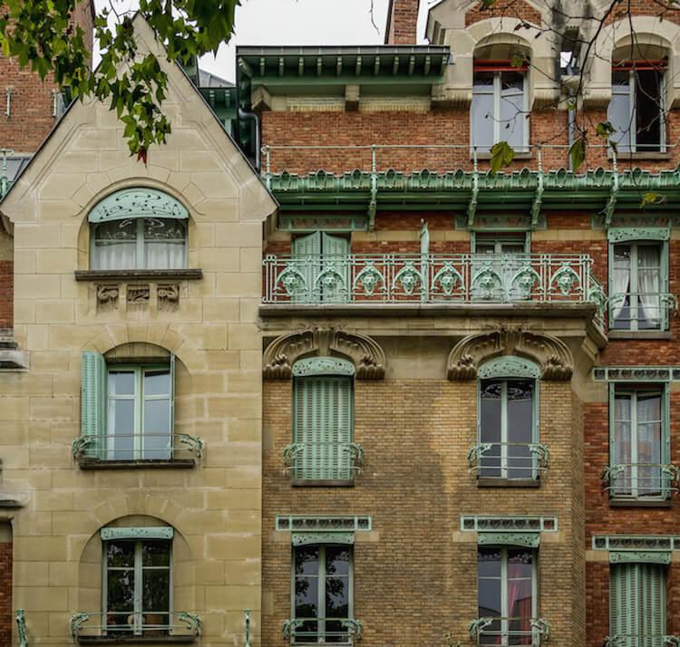 Paris streets: Guimard's creation with sea green wrought iron decor