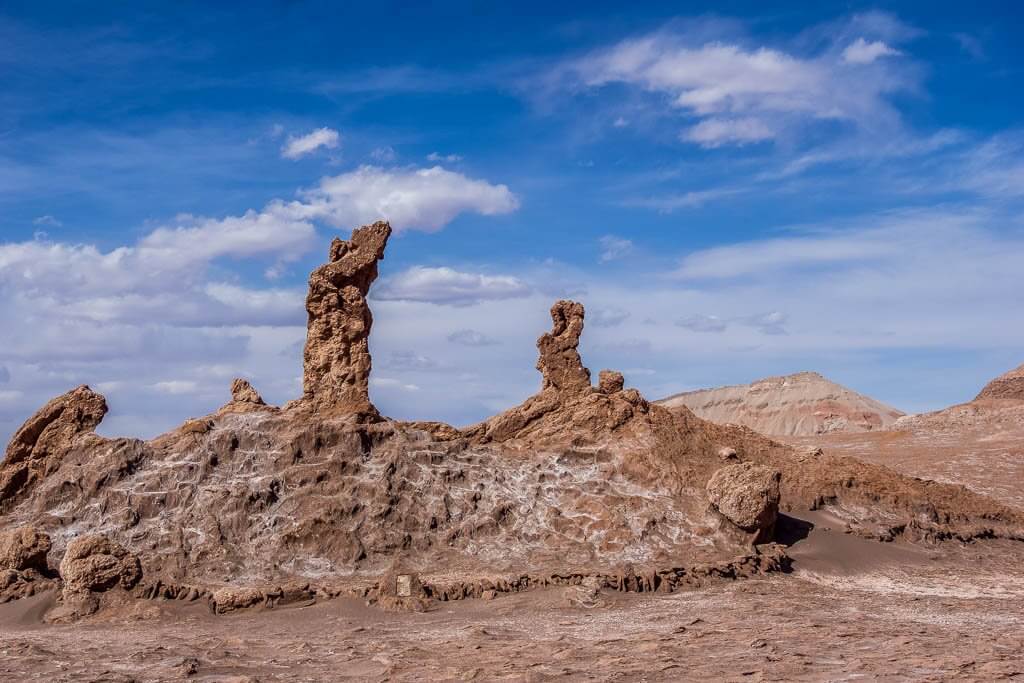 Things to do in San Pedro de Atacama - see the 3 marias - 3 misshapen stone pillars eroded over time in the desert