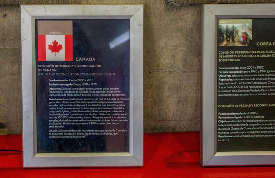 plaque with Canadian flag describing the truth and reconciliation commission to apologize for having residential schools