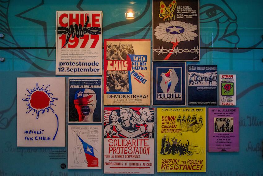 things to do in Santiago Chile - see all the posters wall declaring down with the Chilean dictatorship and supporting the people