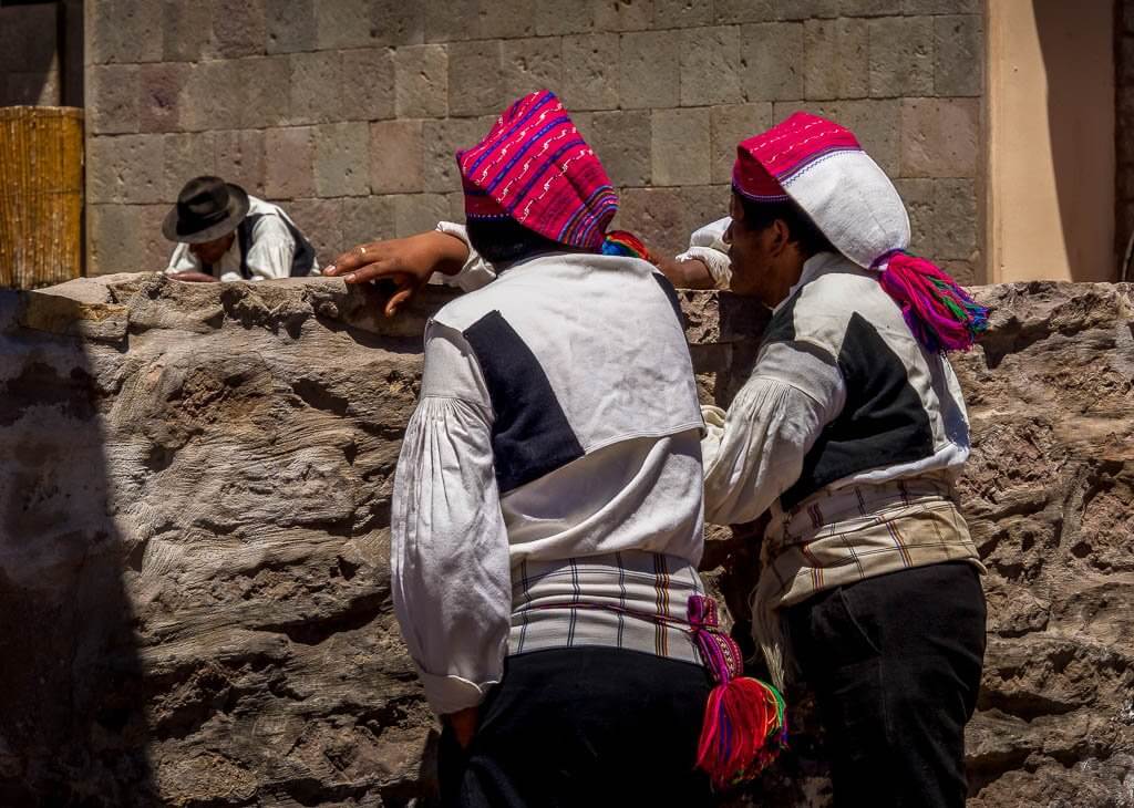 Two men with their traditional hats on Isla Taquile