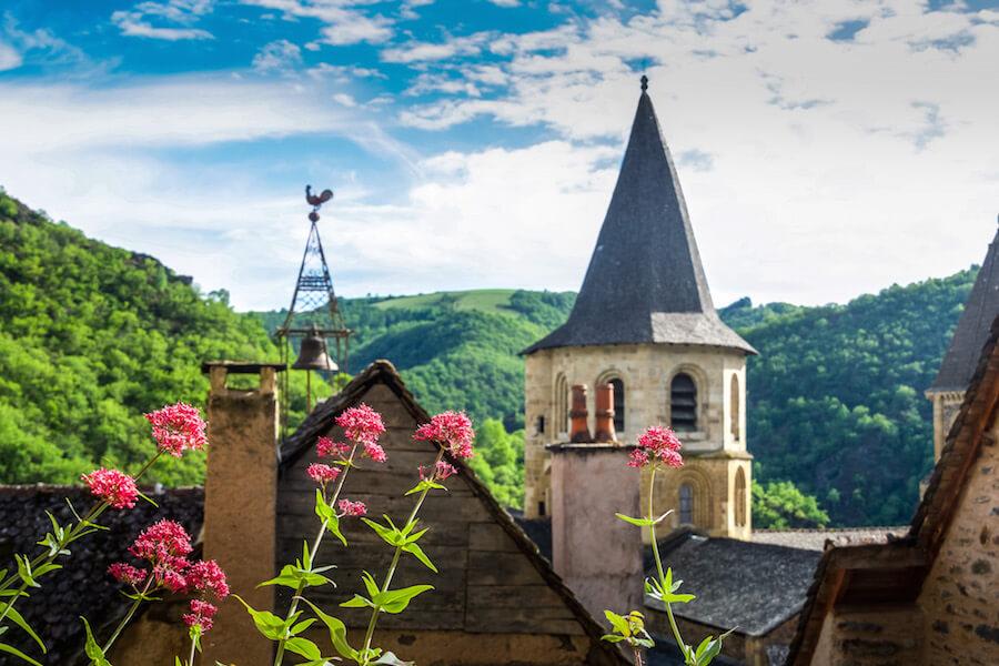Conques France - view over the rooftops and the church tower