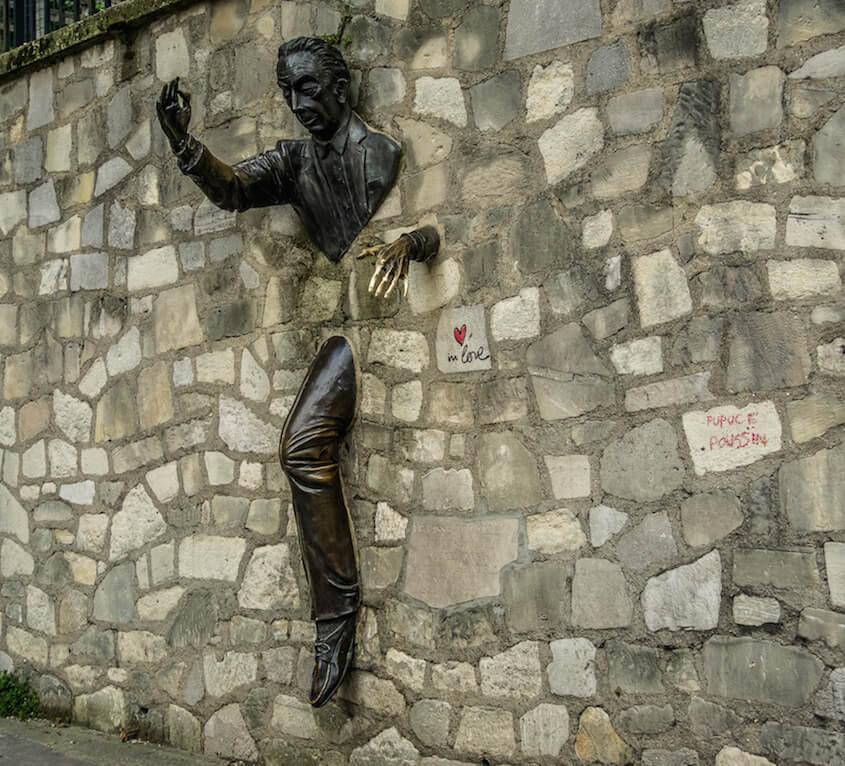 Things to do in Montmartre Paris, see the man walking out of the wall
