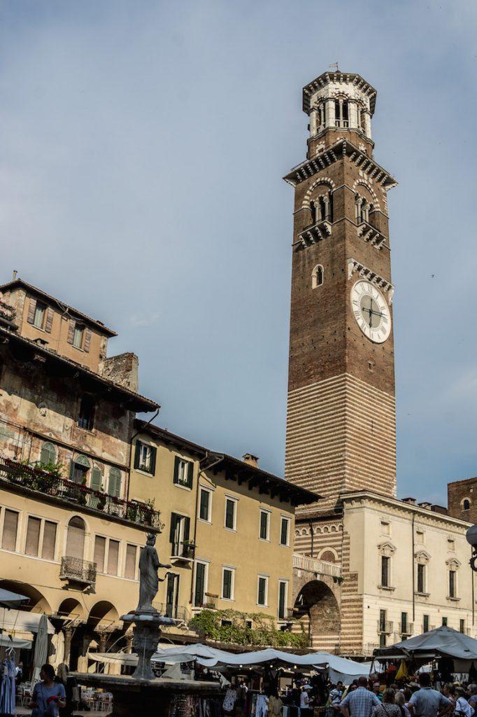  Verona Italy; the tall red brick clock tower