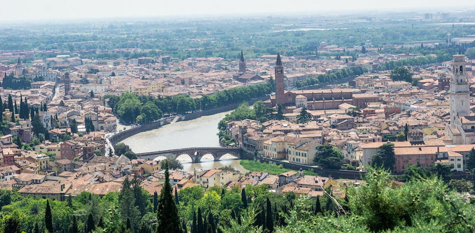 Things to do in Verona: look at the view of the river and towers and red roofs