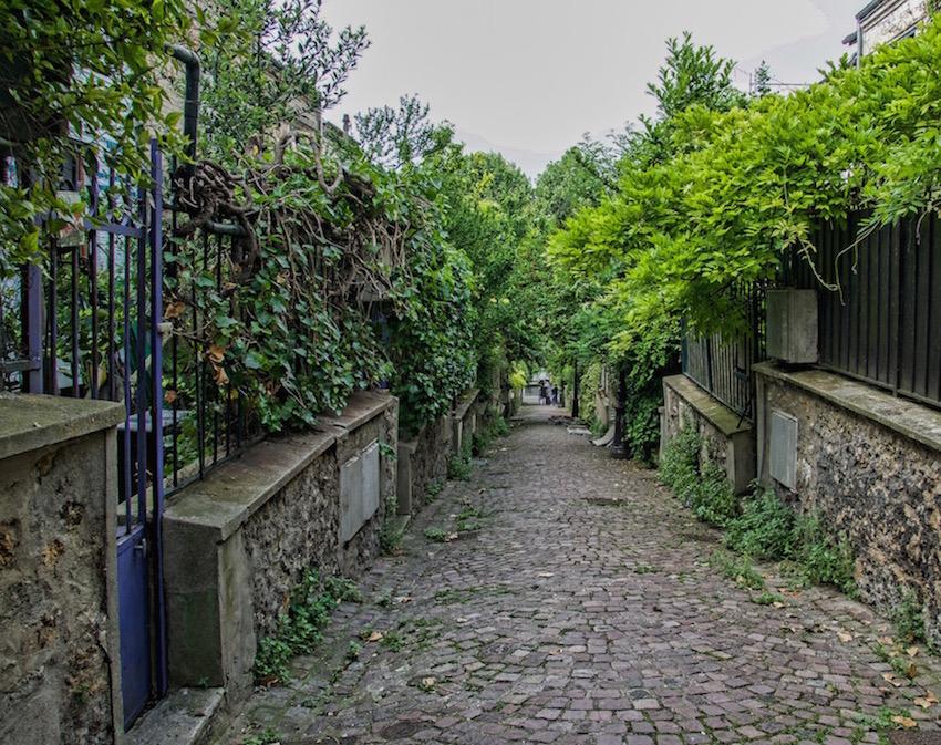 Paris streets: cobbled lane with much greenery