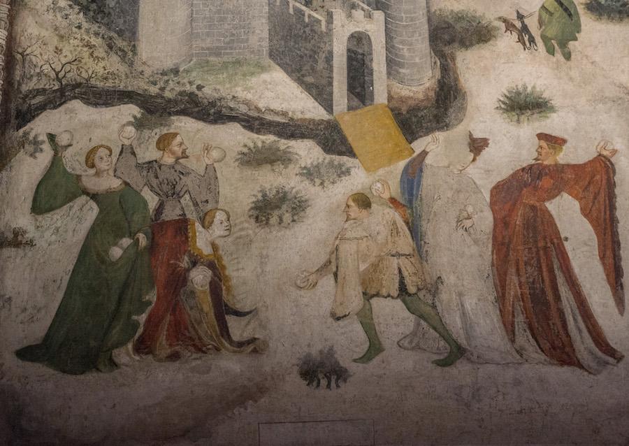 Famous frescoes: painting of a snowball fight, people dressed in long gowns