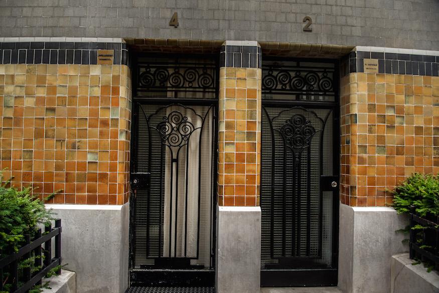 Art Nouveau in Paris 16: 2 doors side by side with floral designed wrought iron doorways