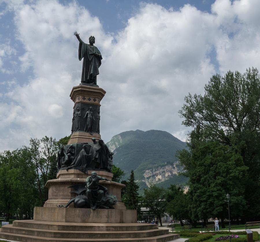  tall statue with mountains in background