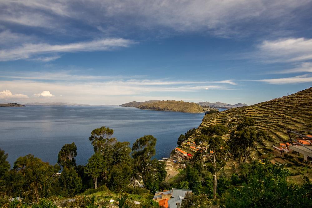 South America travel route: looking out over lake titicaca and the terraces of isla del sol, bolivia 