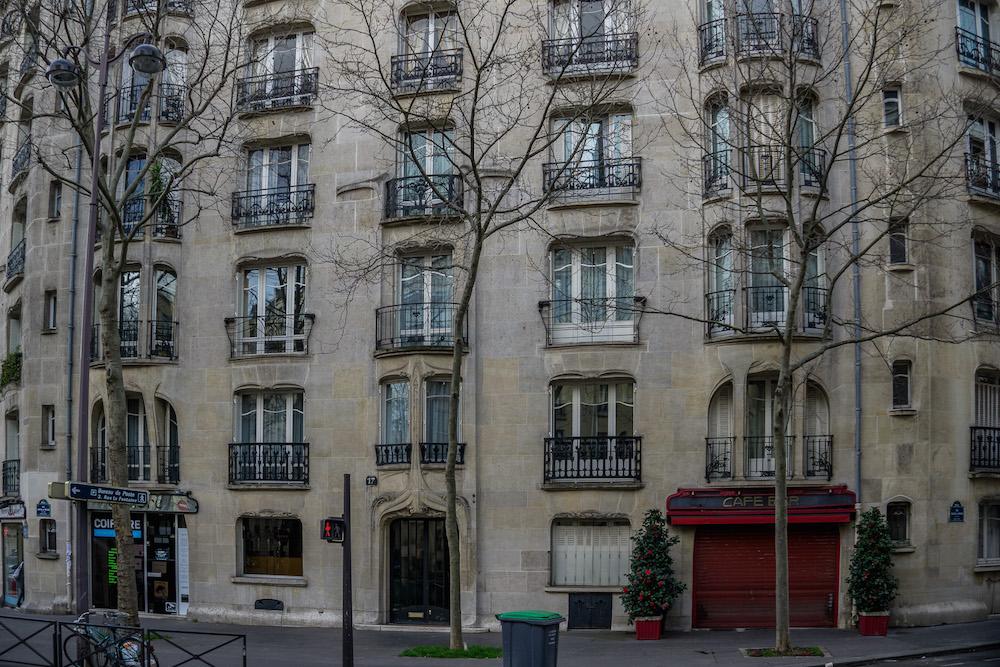 Guimard in Paris 16 - facade with red fronted bar 