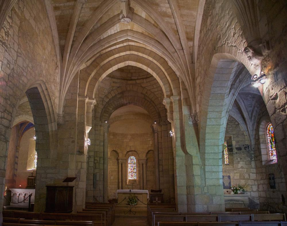 inside the church at Carsac in the Dordogne Valley - white stone archways