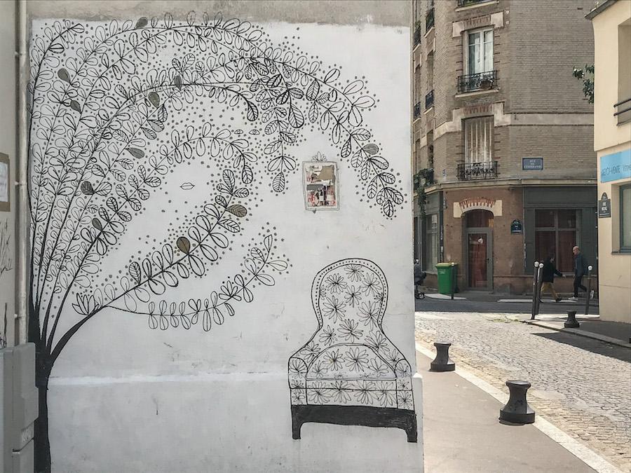 Take a seat - street art of an armchair in La Butte aux Cailles, Paris