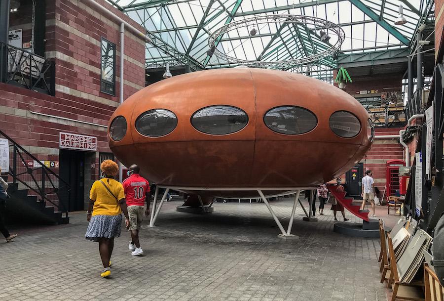the Paris Flea Market (le Marché aux Puces de St. Ouen) - the rust coloured oval spaceship at Marche Dauphine 