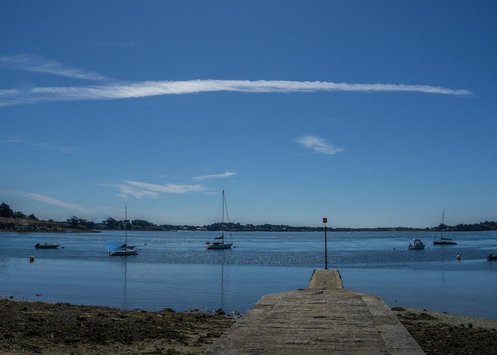 a pier and sailboats on ile aux Moines, Brittany