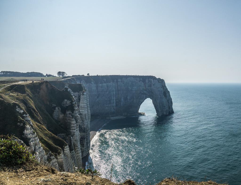 view of the cliffs of Etretat and the archway the Porte d'Aval