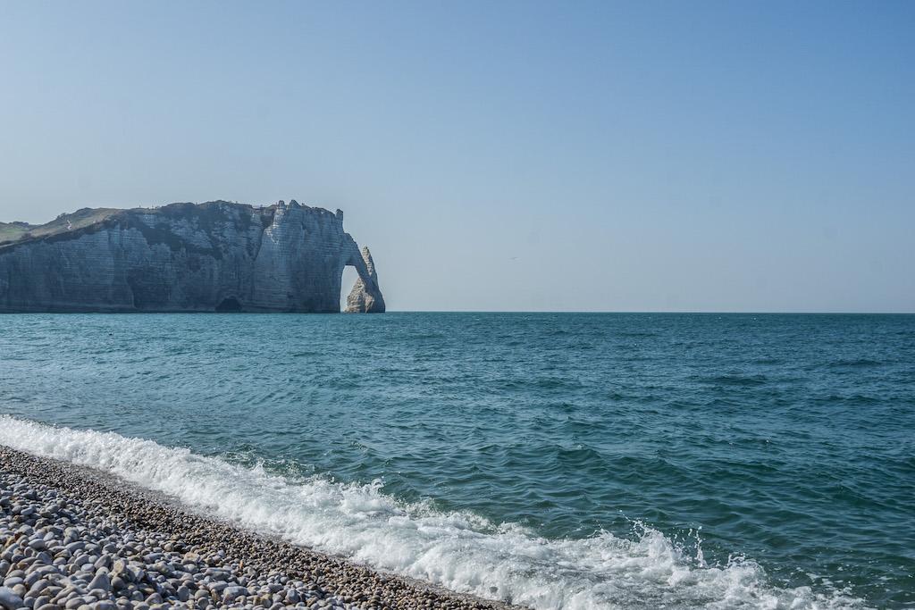 Glorious view of cliffs of Etretat and the pebbled beach
