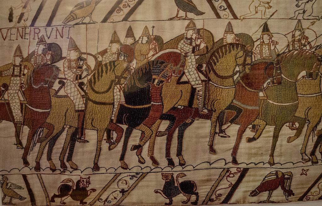 The Bayeux tapestry - horses and soldiers riding into battle