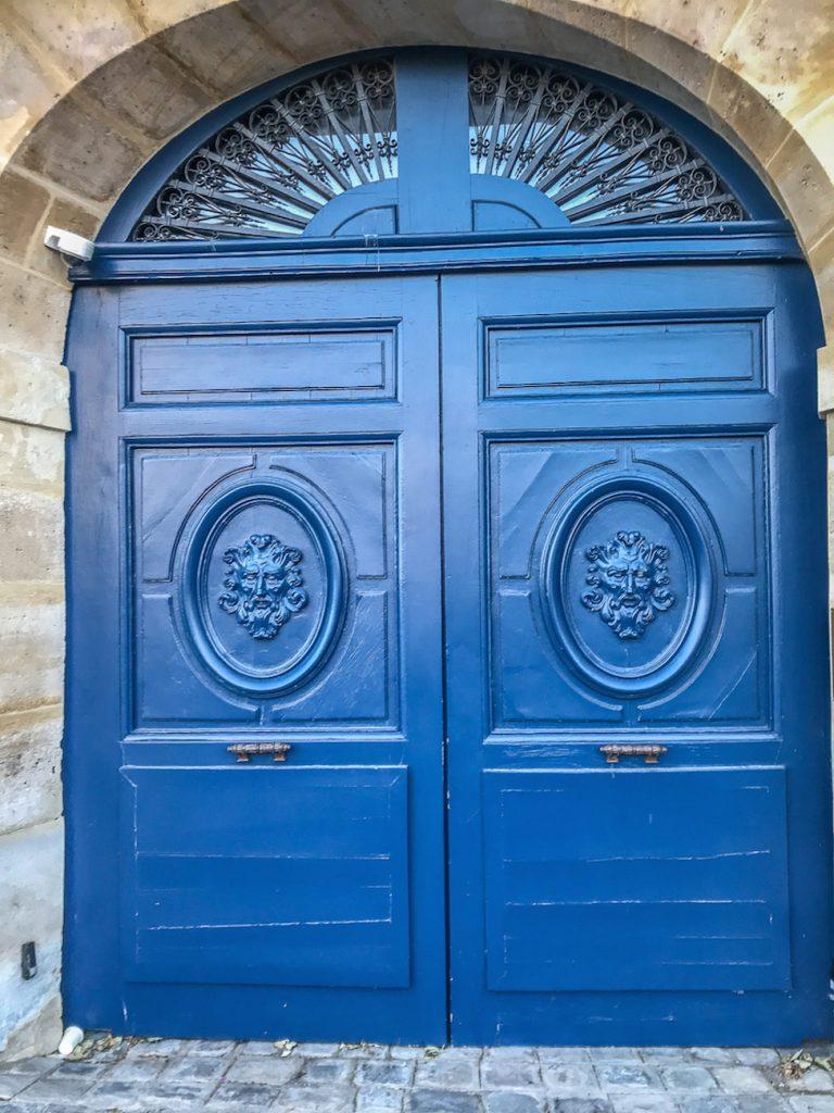 blue door on ile saint-louis, paris