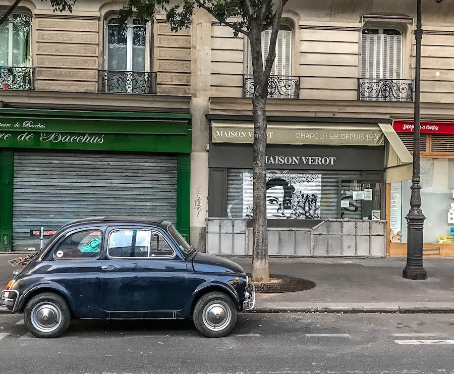 le marais in Paris - a little car parked on the street
