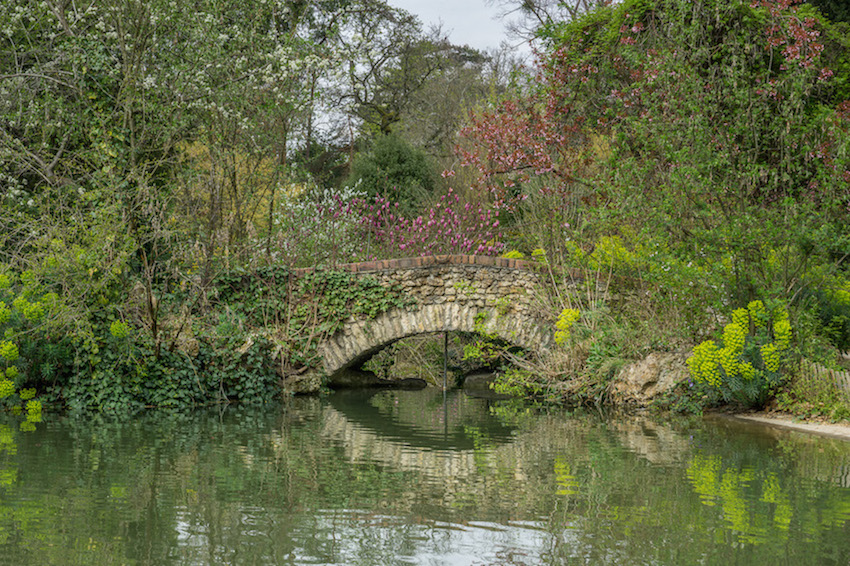 stone bridge reflected in the water 