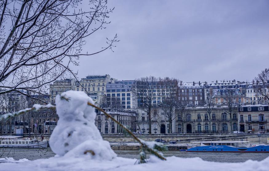 Paris in Winter - snowman and the Seine